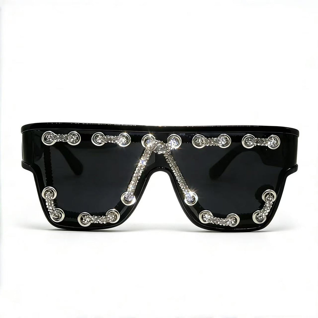 Ladies sunglasses with extravagant design and decorative chain embellishment Kalsten