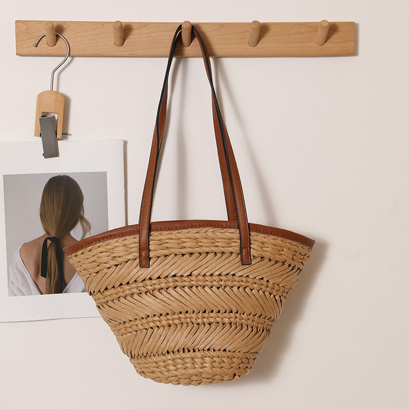 Braided basket bag with innovative leather handles Kalsten
