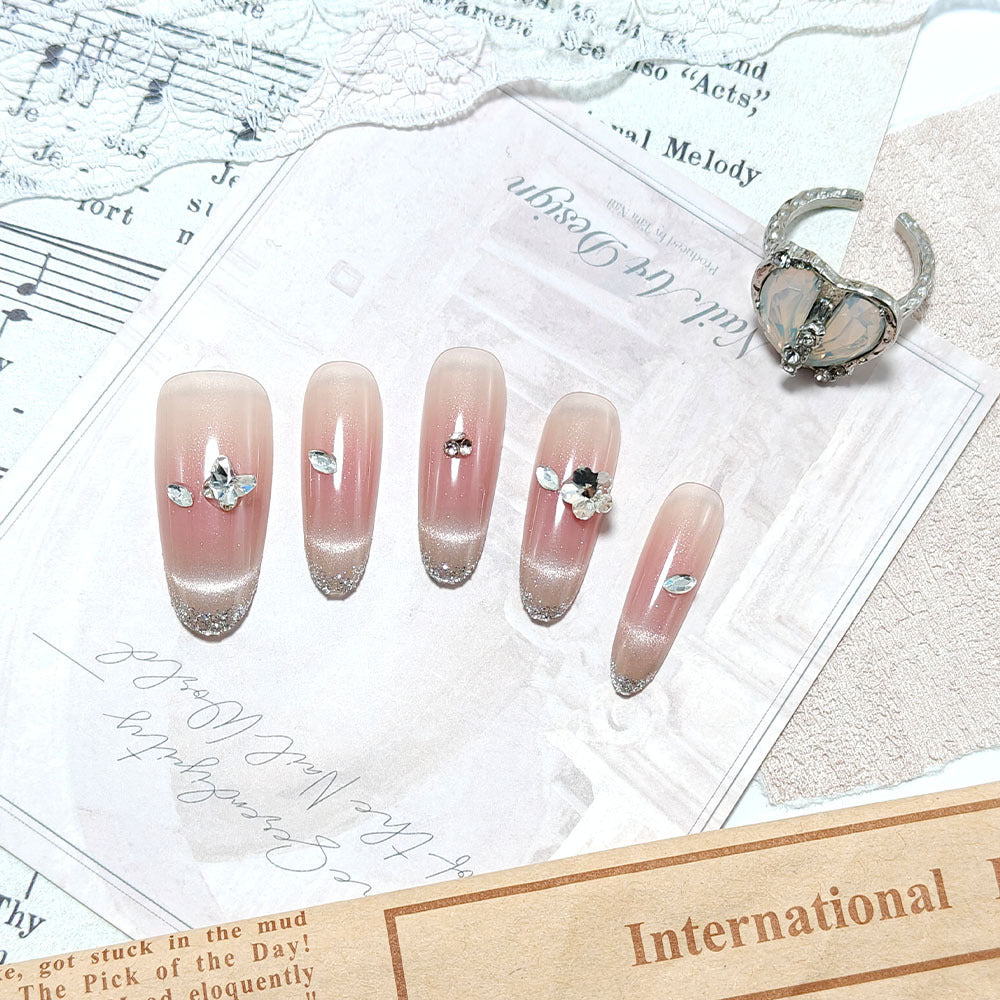 Glamorous artificial nails with rhinestone decorations Kalsten