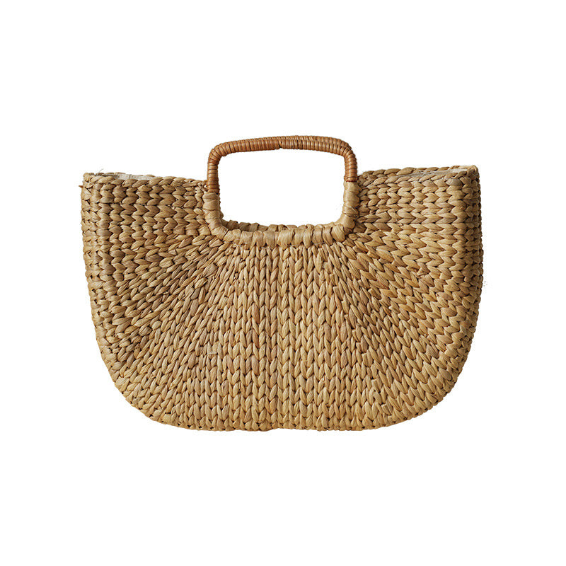 Handmade beach bag made of braided rattan Acalora
