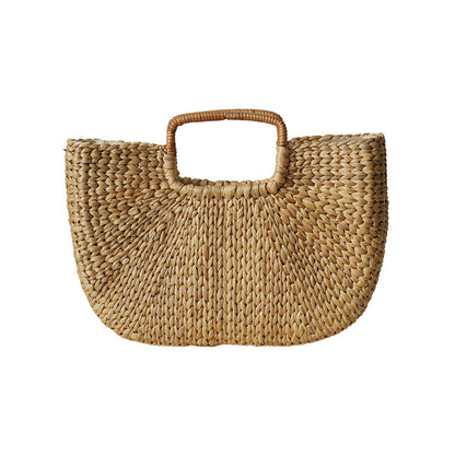 Handmade beach bag made of braided rattan Acalora