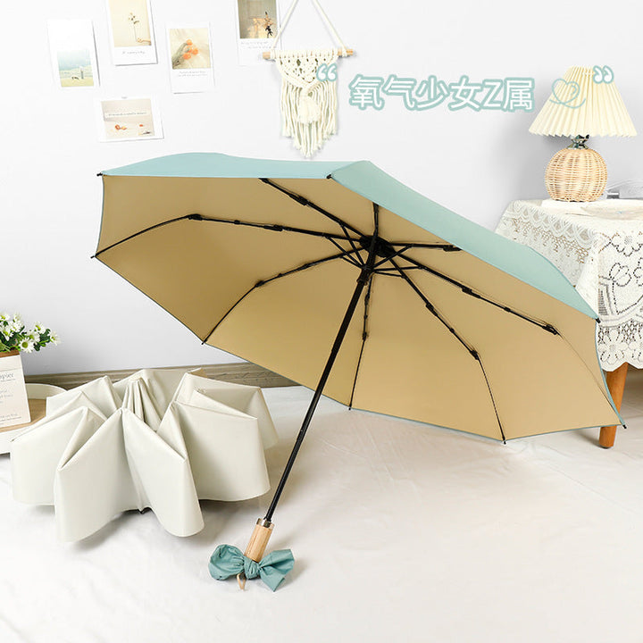 Women compact folding umbrella with stylish design and practical carrying strap Kalsten