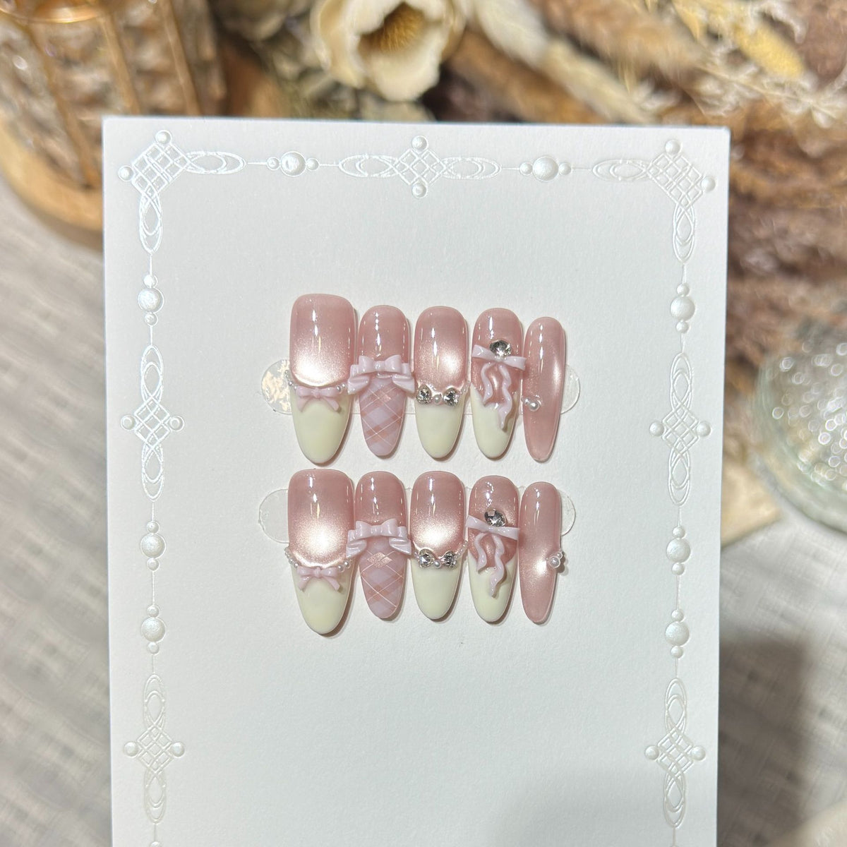 Elegant Stiletto Press-On Nail Set with Decorative Bow and Gem Accents Acalora