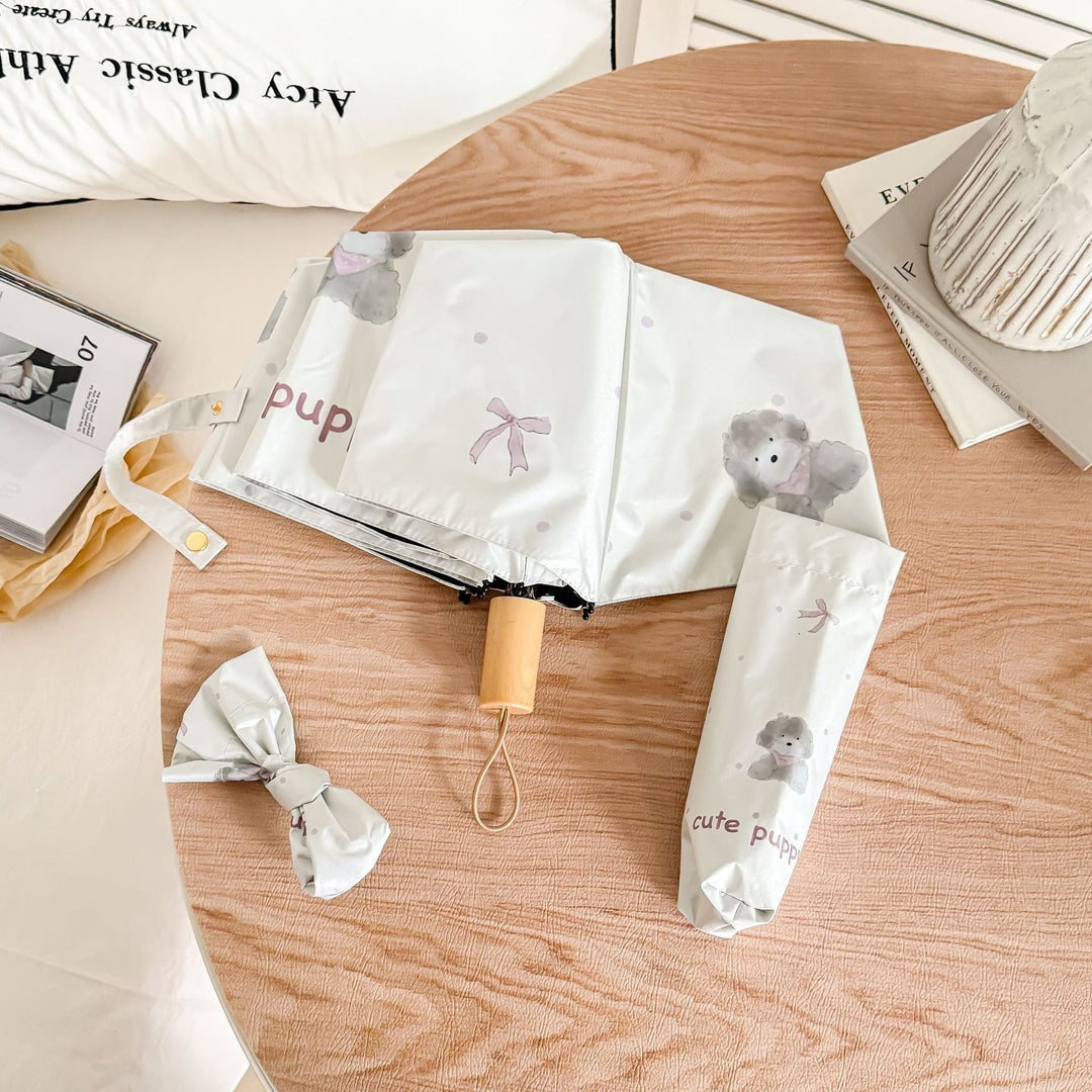 Ladies folding umbrella with playful animal design Kalsten