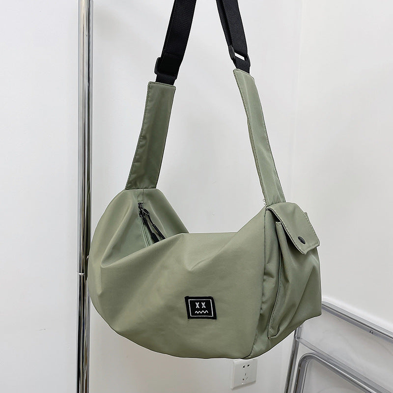 Sporty shoulder bag with adjustable carrying strap Kalsten