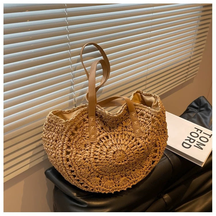 Round-woven beach bag with leather handles Kalsten