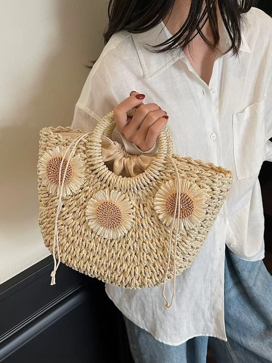 Handbag made of natural material with floral accents Kalsten