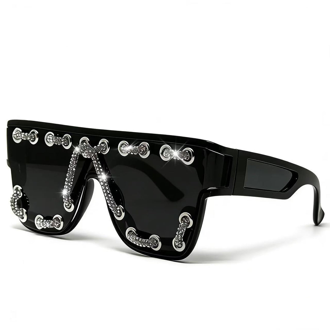 Ladies sunglasses with extravagant design and decorative chain embellishment Kalsten