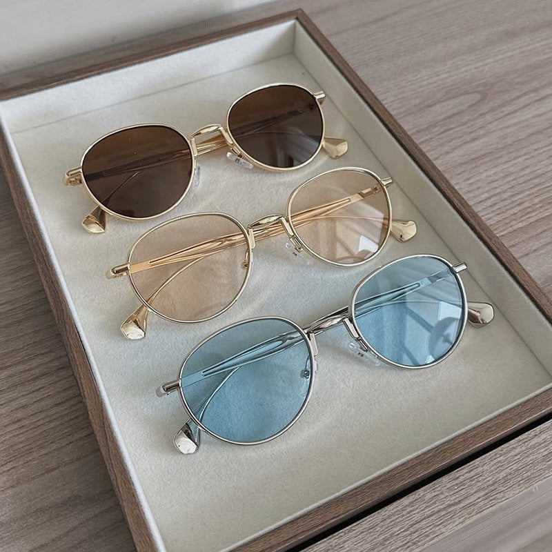 Women's round sunglasses with elegant metal frame and UV protection Kalsten