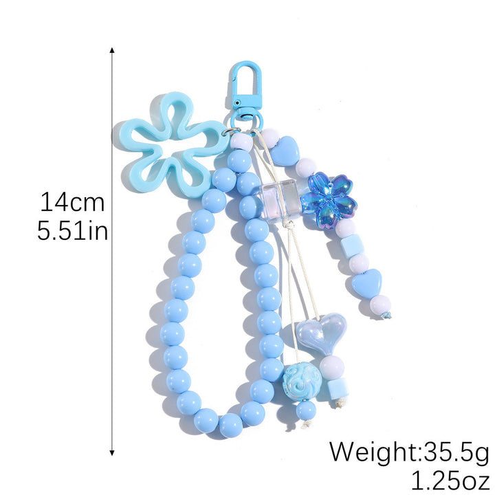 Playful keychain with flower and butterfly details Kalsten