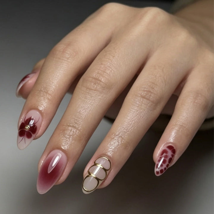 Artificial nails with elaborate flower designs and elegant accents Kalsten