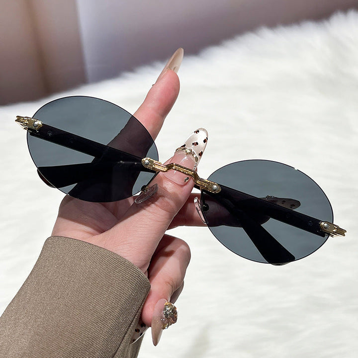 Ladies fashionable and elegant sunglasses with oval design Kalsten