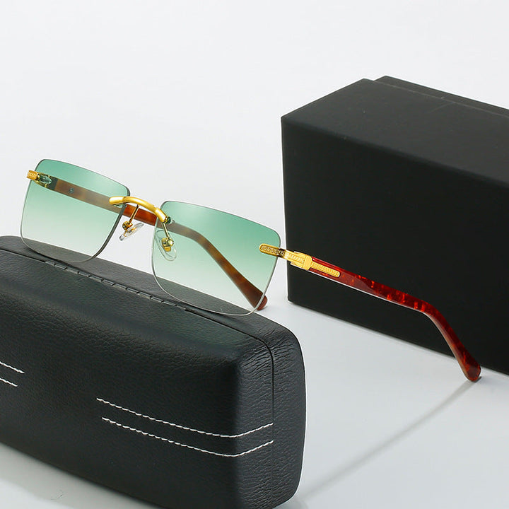Women's fashionable sunglasses with a stylish, rectangular frame and elegant metal accents Kalsten