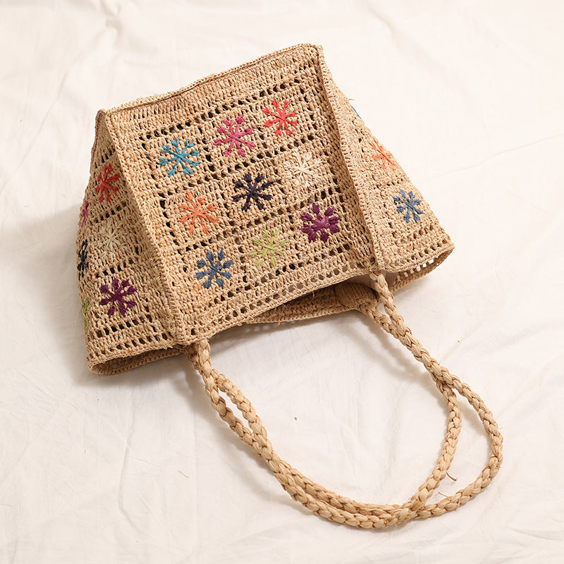 Handcrafted straw bag with colorful embroidery design Kalsten