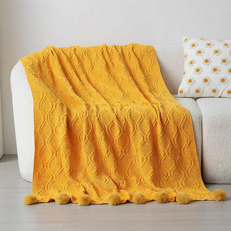 Ladies knit blanket with decorative pom poms Kalsten