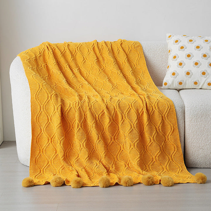 Ladies knit blanket with decorative pom poms Kalsten