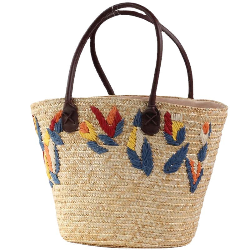 Braided beach bag with colorful embroidery pattern Kalsten