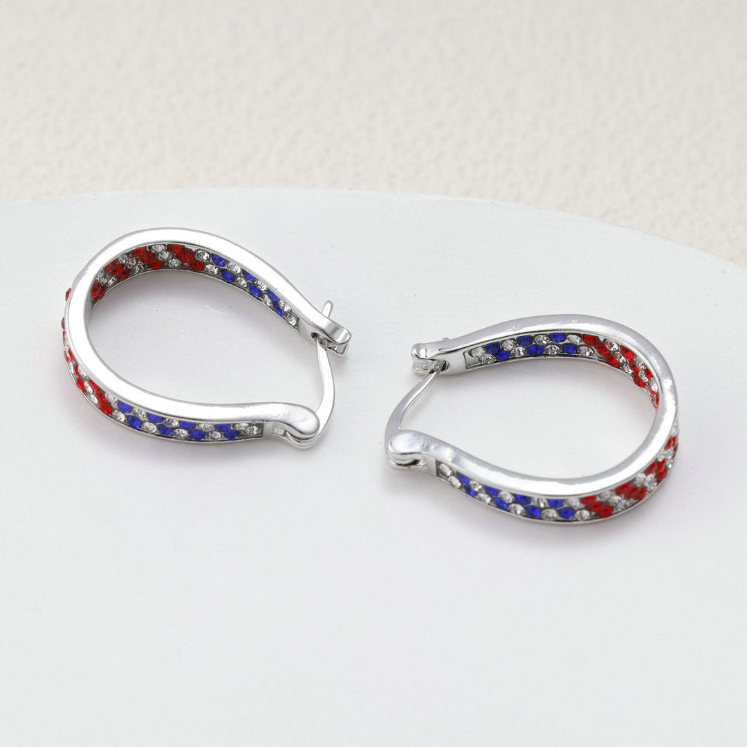 Ladies nano curved clip-on earrings with dense rhinestone embellishment and polished metal alloy Kalsten