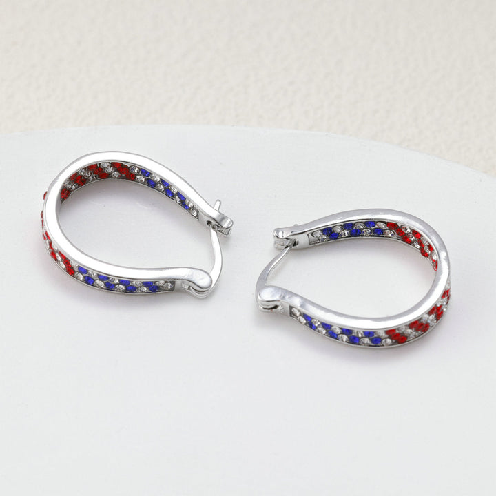 Ladies nano curved clip-on earrings with dense rhinestone embellishment and polished metal alloy Kalsten