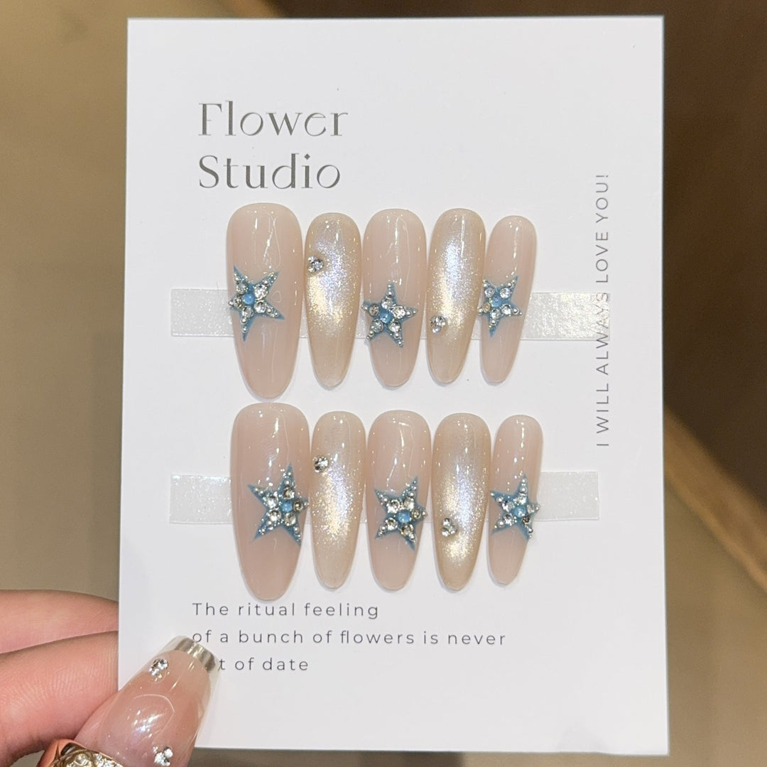 Glamorous artificial nails with star accents Kalsten