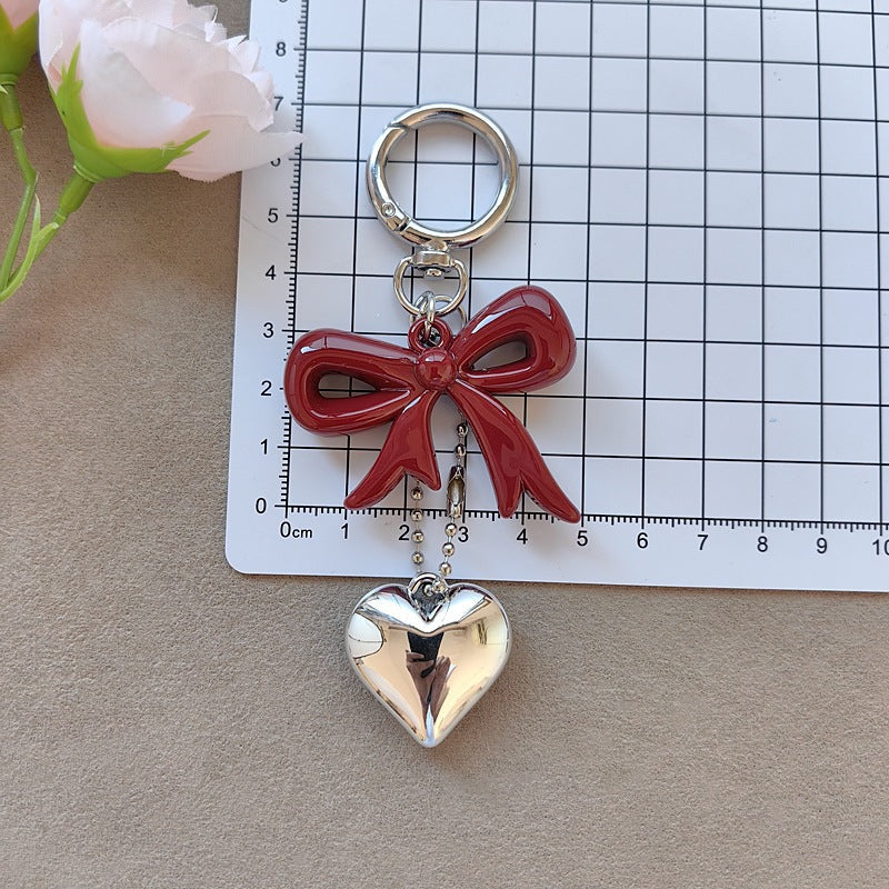 Keychain with bow and heart motif Kalsten