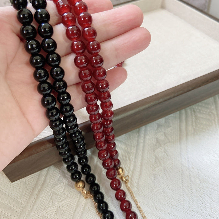 Fashionable jewelry band made of onyx beads Kalsten