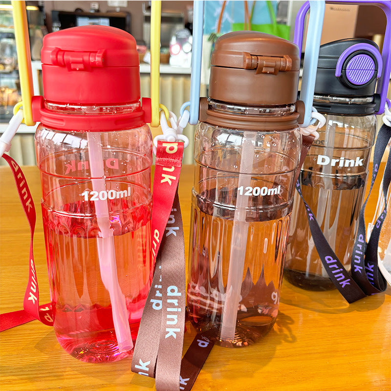 Women's large transparent drinking bottle with integrated carrying handle Kalsten