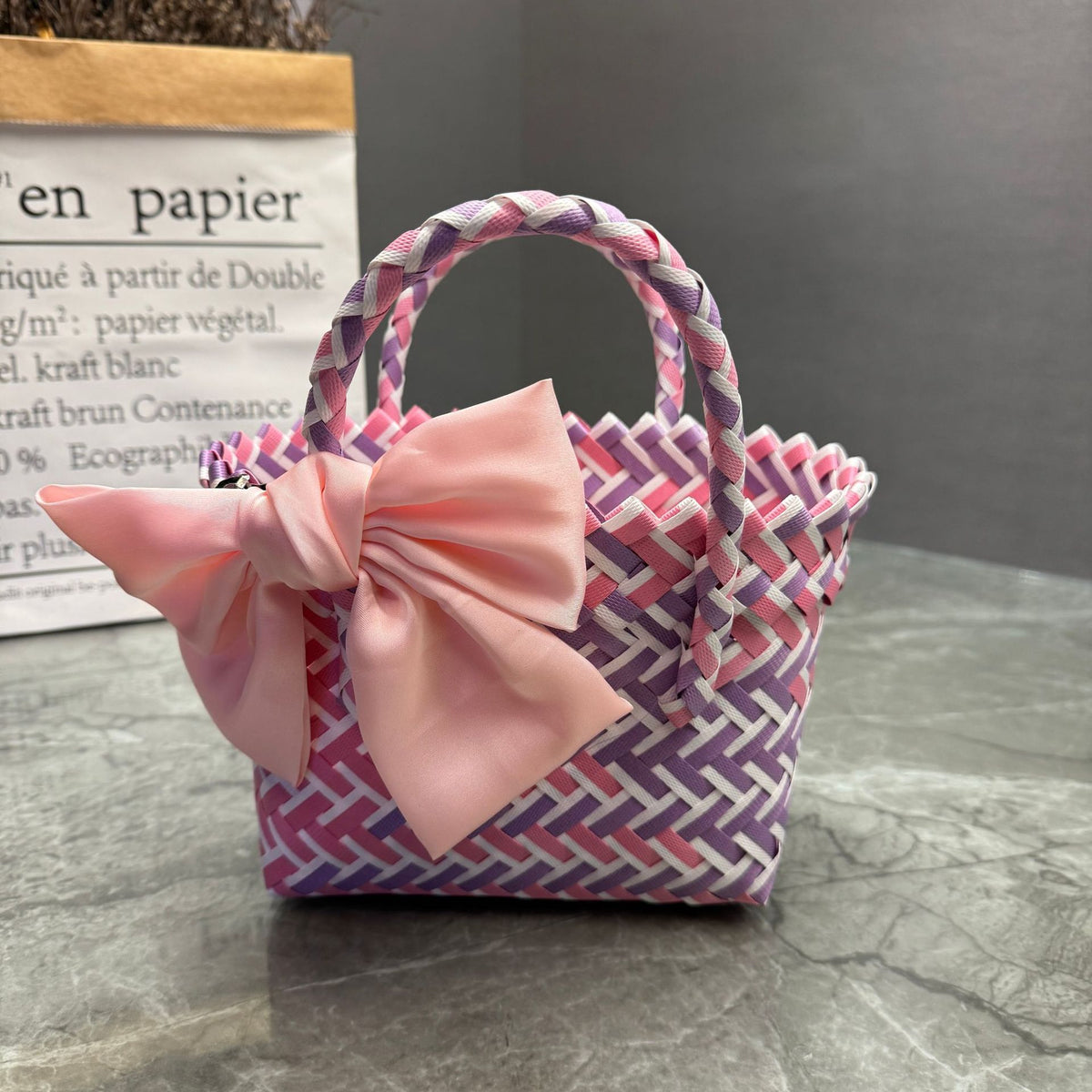 Playful basket bag with bow Acalora