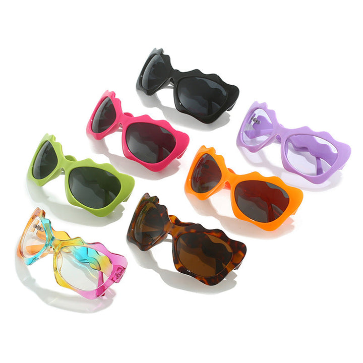 Ladies extravagant sunglasses with wavy frame design Kalsten