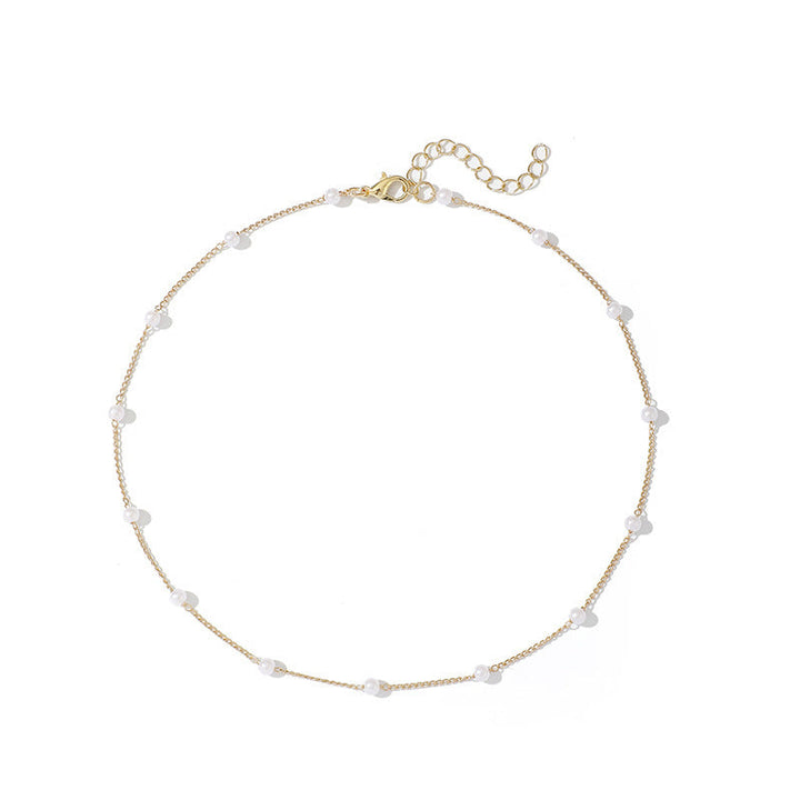 Delicate Pearl Necklace with Fine Gold Stand Kalsten