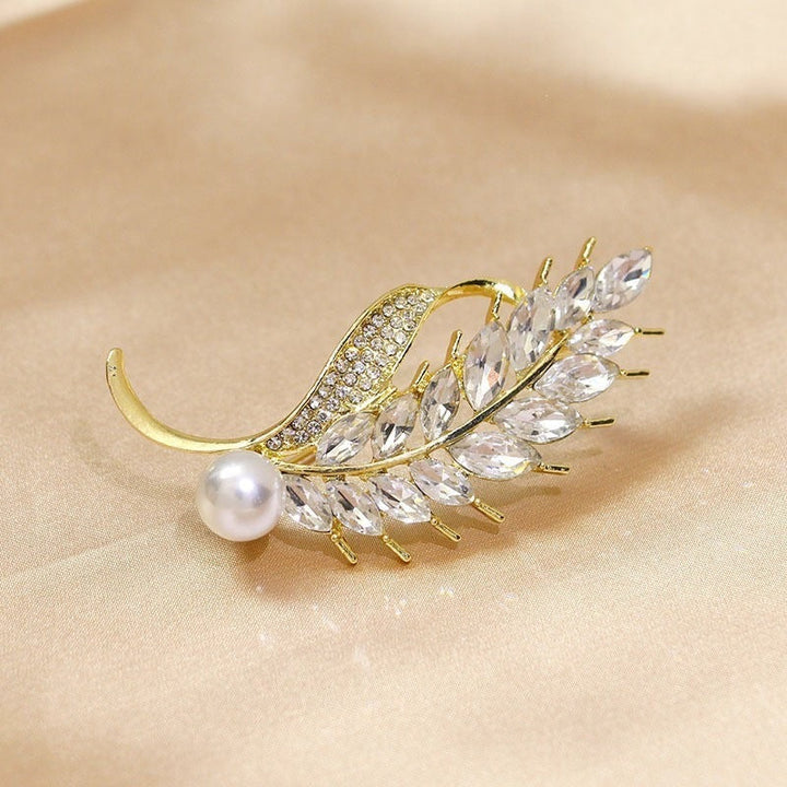 Elegant brooch with glitter stone and pearl Kalsten
