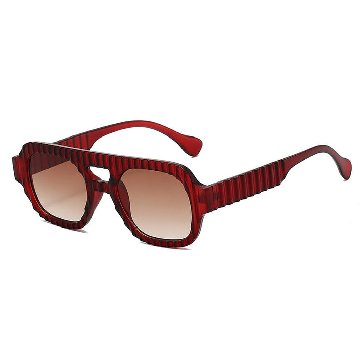Ladies fashionable sunglasses in futuristic design with textured frame Kalsten
