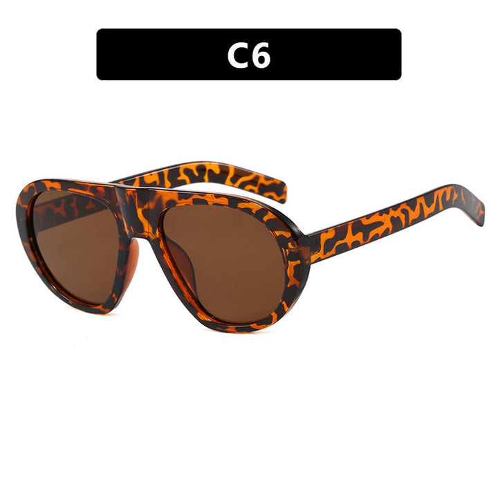 Women striking sunglasses with futuristic frame and sturdy design Kalsten