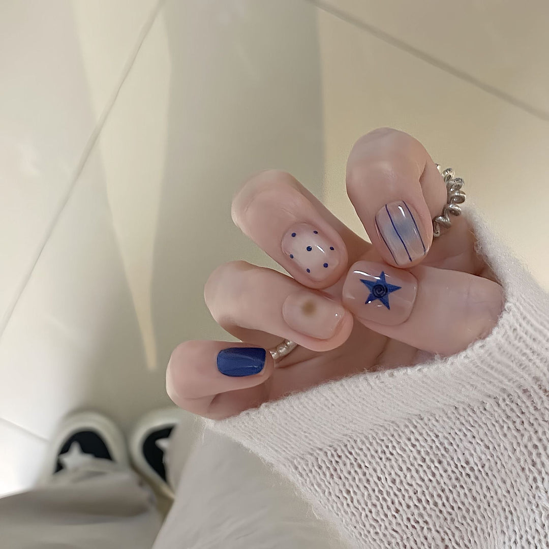 Artificial nails in modern design with geometric and sparkling accents Kalsten