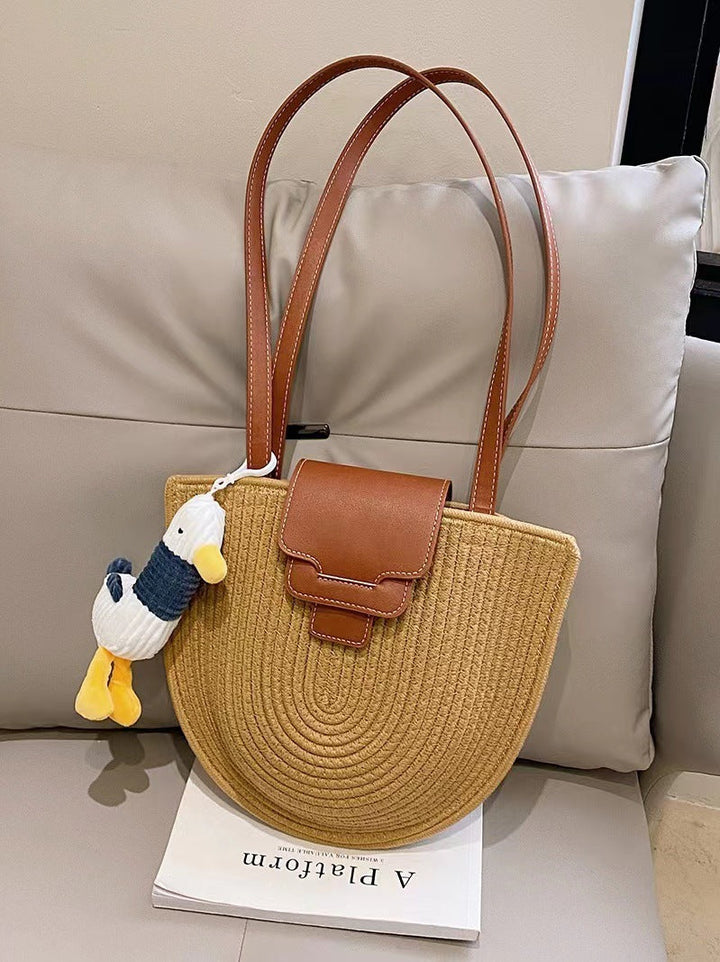 Fashionable Tote Bag Made of Woven Material with Playful Pendant Kalsten