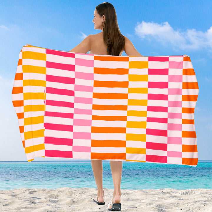 Beach towel with vibrant gradient color and stylish striped design Kalsten