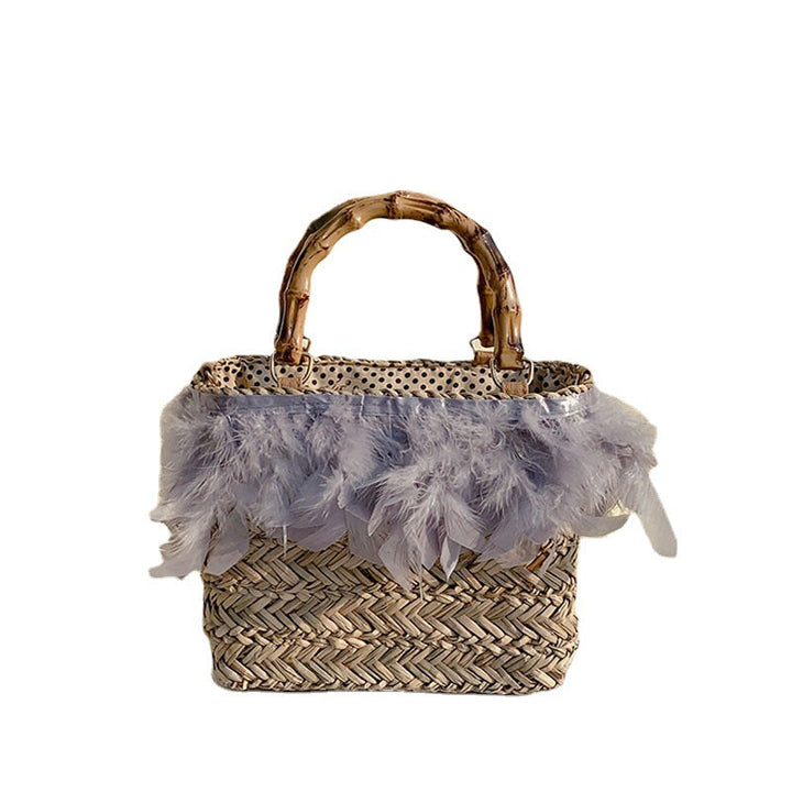 Elegant handbag with feathers and bamboo handles Kalsten