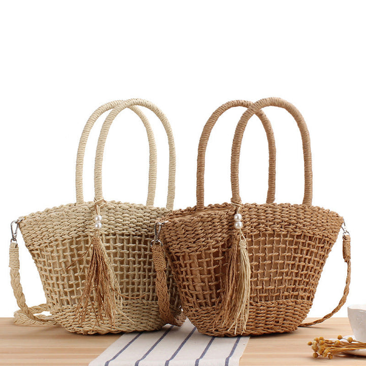 Handbag made of braided natural material with elegant tassel decoration Kalsten