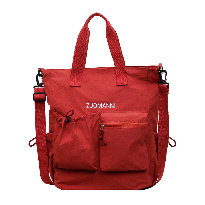 Tote bag with multifunctional outer pockets and adjustable shoulder strap Kalsten