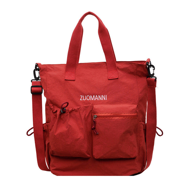 Tote bag with multifunctional outer pockets and adjustable shoulder strap Kalsten