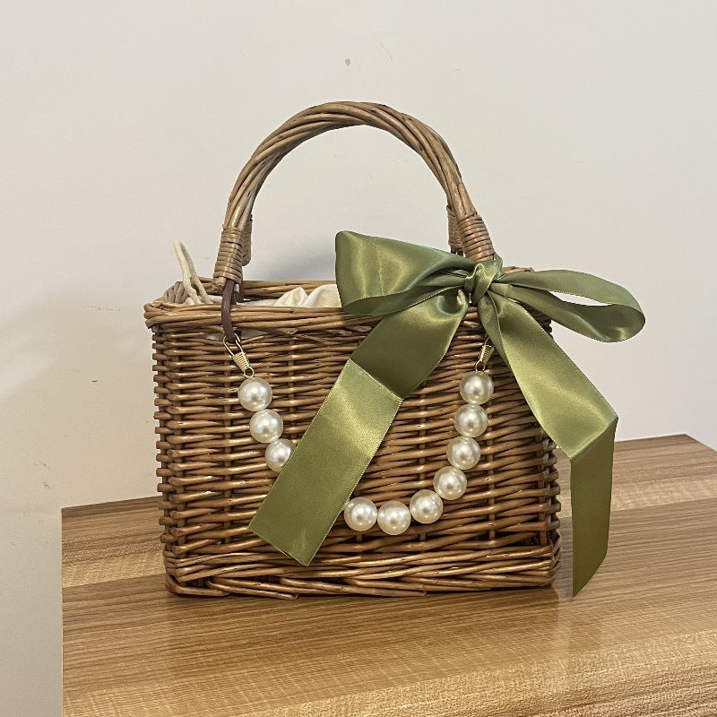 Ladies' basket bag with decorative pearl accents and bow decoration Kalsten