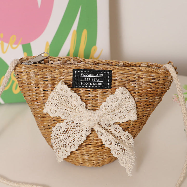 Playful straw shoulder bag with floral accents Kalsten