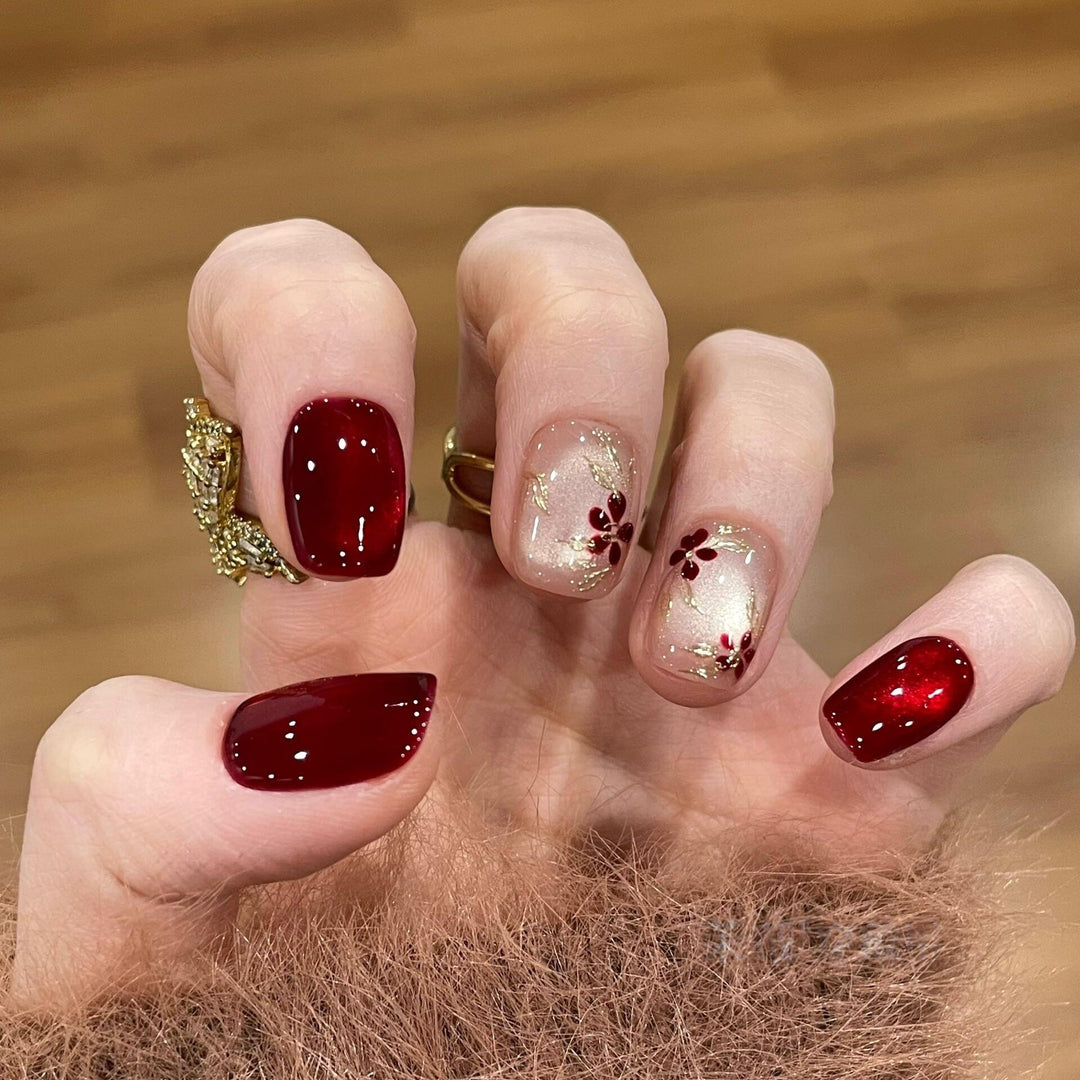 Artificial nails with elegant floral and glitter designs Kalsten