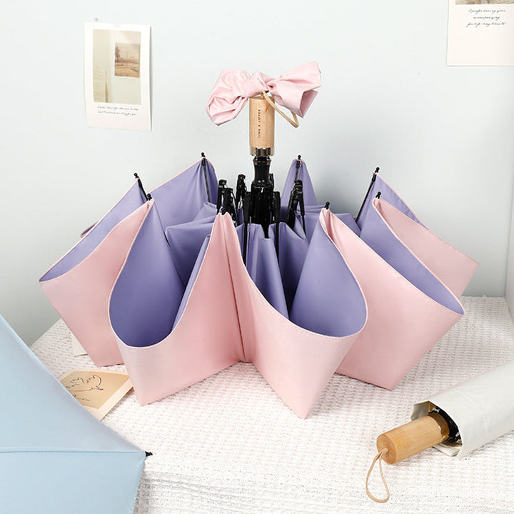 Ladies stylish handheld umbrella with decorative design Kalsten