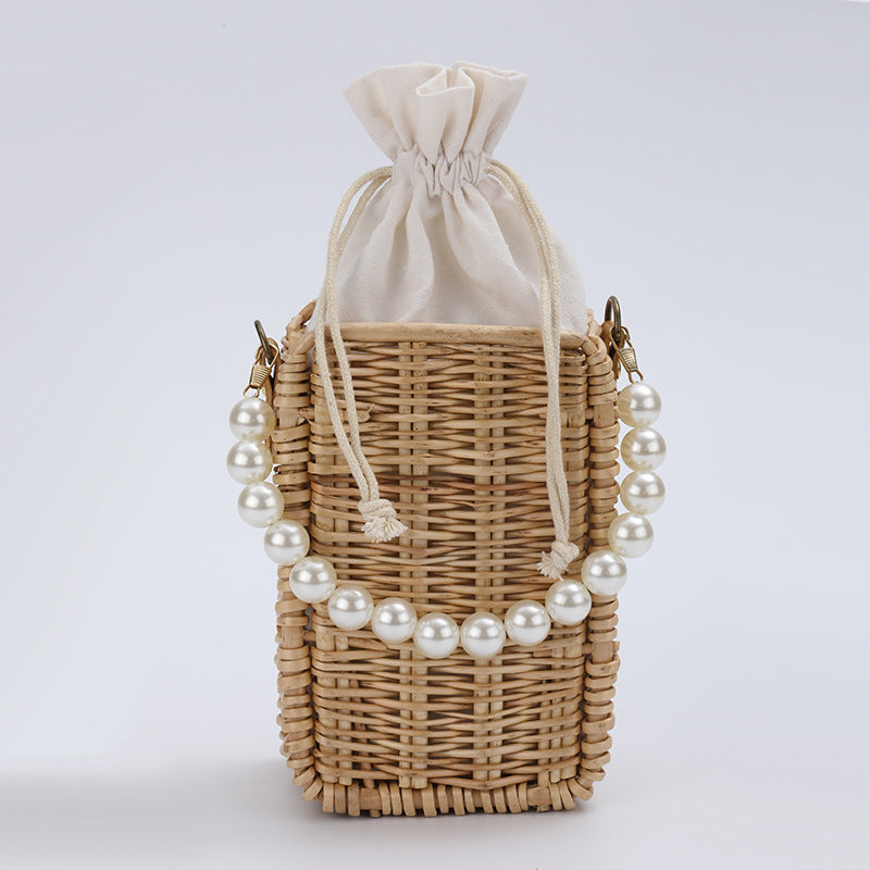 Women's handbag made of woven material with pearl accents Kalsten