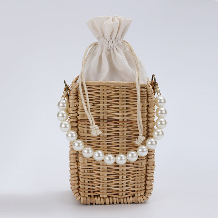 Women's handbag made of woven material with pearl accents Kalsten