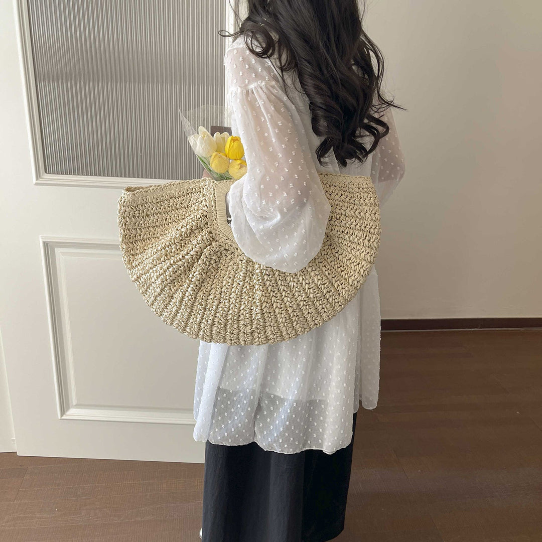 Handcrafted straw bag with elegant pleats Kalsten