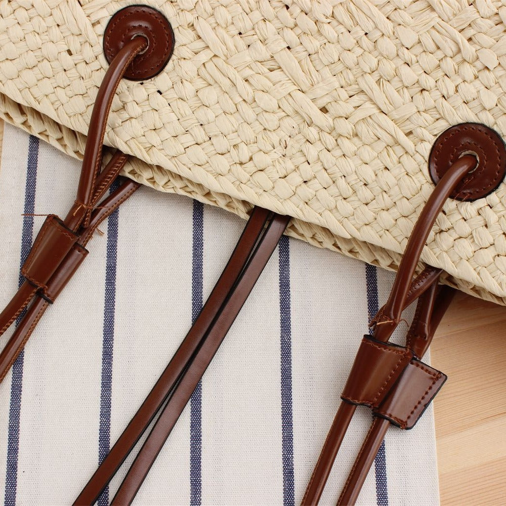Beach bag made of high-quality braided straw with stylish leather handles Kalsten