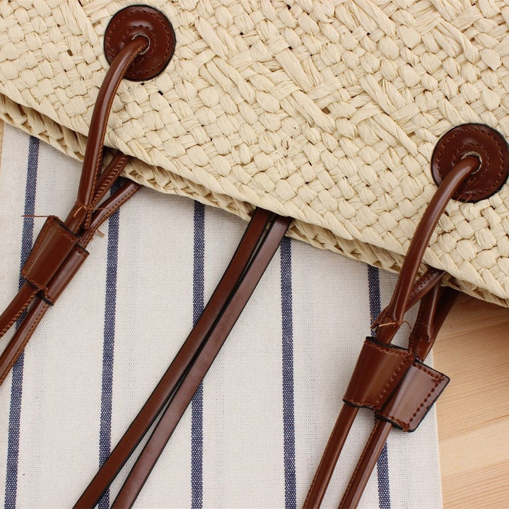 Beach bag made of high-quality braided straw with stylish leather handles Kalsten