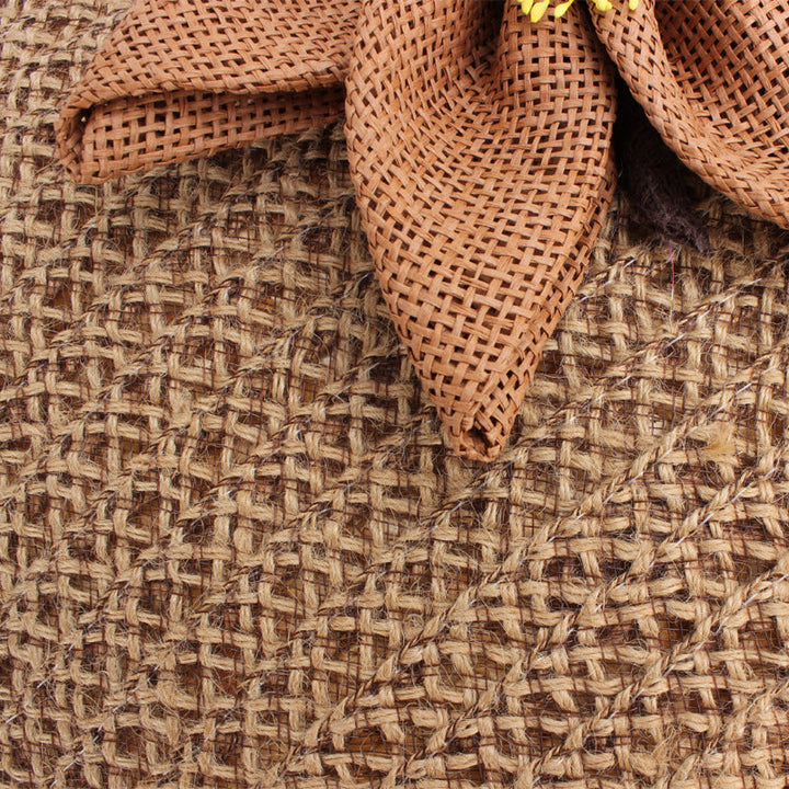 Handbag with floral appliqué Made of natural material Kalsten